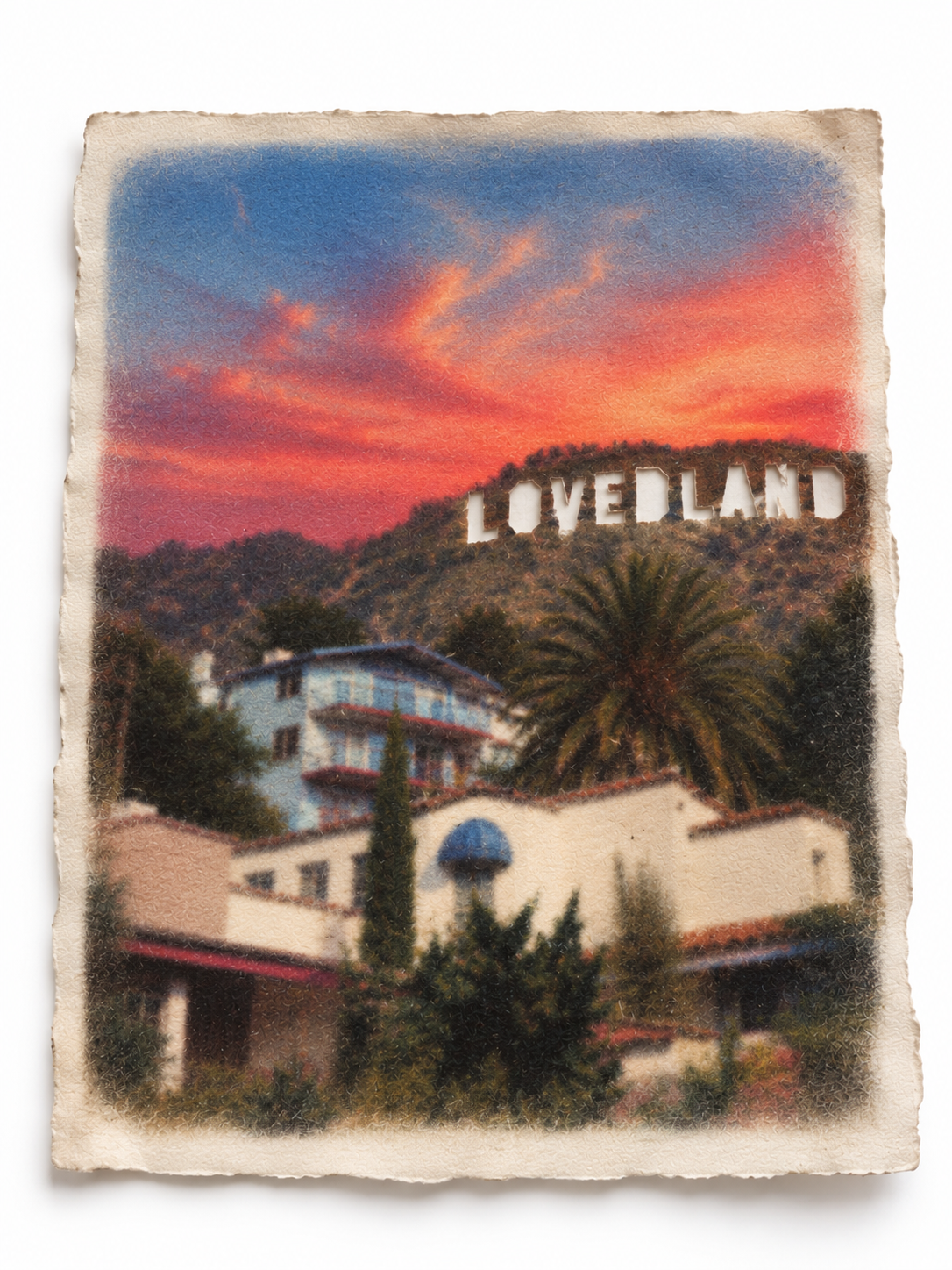 Close view of the LOVEDLAND sign above a house and palm tree