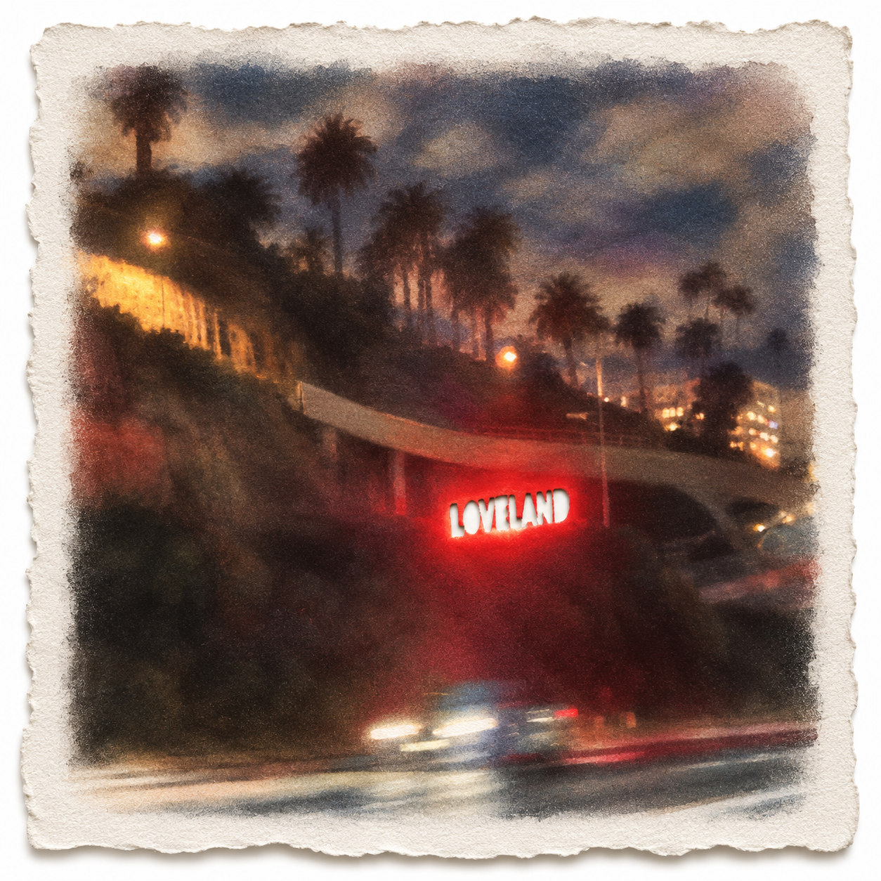 Red LOVEDLAND neon beneath palm trees at dusk